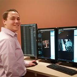MCC radiologic tech graduate at work at the University of Rochester